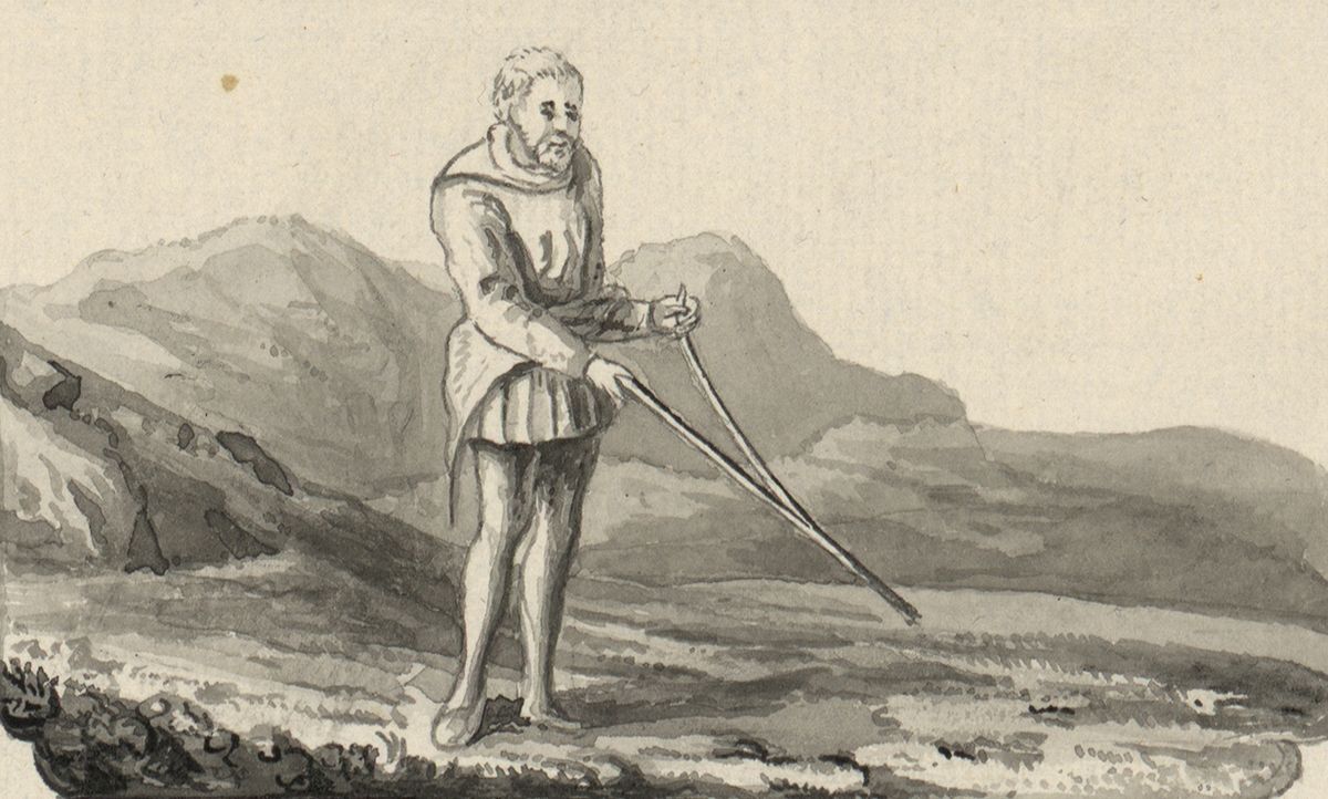 Picture of a man using a dowsing stick